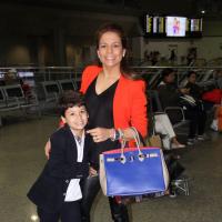 Nivea Stelmann, sem o marido, viaja para Disney com o filho, Miguel