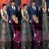 Jennifer Lawrence se atrapalhou ao prender uma rosa na lapela da roupa do ator Donald Sutherland e deixou cair no chão. Ao se abaixar para pegar, precisou colocar uma das mãos sobre o decote para não mostrar demais