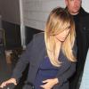 Kim Karadashian empurra o carrinho de bebê da filha, North West