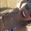 Ex-BBB Munik se diverte ao mergulhar na praia em Fortaleza: 'Água quentinha'