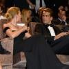 Na mesma edição do Festival de Veneza, Scarlett estava acompanhada do jornalista francês Romain Dauriac, de quem noivou recentemente. Os dois estão juntos desde o final de 2012