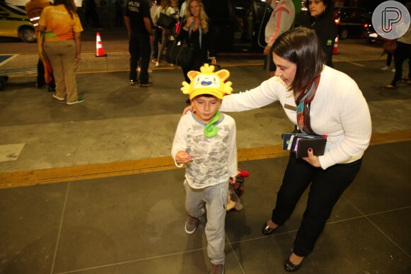 Benjamin chegou ao aeroporto usando um boné do mascote das Olimpíadas