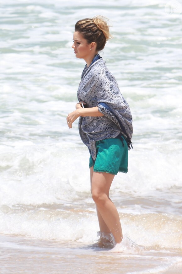 Sandy exibiu a boa forma ao aparecer de biquíni durante as gravações de um comercial da marca Havaianas, na praia de Grumari, Zona Oeste do Rio de Janeiro, nesta terça-feira, 8 de novembro de 2016