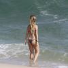 Juliana Didone, atriz que atua na novela da Record, 'Pecado Mortal', exibiu o corpo em forma na praia da Barra da Tijuca, Zona Oeste do Rio de Janeiro, na tarde desta terça-feira, 6 de janeiro de 2014