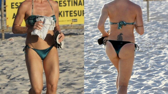 Leticia Spiller, de biquíni, exibe boa forma ao correr na praia da Barra. Fotos!