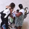 Luciano Szafir embarcou nesta sexta-feira, 31 de janeiro de 2014, com a mulher, Luhanna Melloni, e o filho do casal, David, no aeroporto Santos Dumont, no Rio de Janeiro