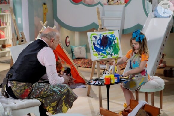 Dulce Maria (Lorena Queiroz) aprende a pintar e misturar cores com Silvestre (Blota Filho), na novela 'Carinha de Anjo'