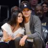 Mila Kunis está grávida de seu primeiro filho com Ashton Kutcher, em 24 de março de 2014