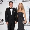John Travolta e Kelly Preston prestigiam festa durante o Festival de Cannes 2014