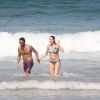 Luana Piovani e Pedro Scooby curtem a praia do Leblon, na Zona Sul do Rio de Janeiro, em 1 de agosto de 2014