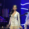 Em 2014, Anitta cantou com Roberto Carlos em seu especial usando um look de renda e tule.