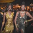 Baile da Vogue: Indyra carvalho e Mari Calazan de brilho metalizado dourado e prata