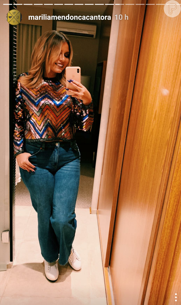 Marilia Mendonça está vestindo looks com manequim 40
