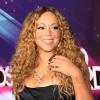 De acordo com Nick Cannon, marido de Mariah Carey, a pose de diva não passa do palco. Em casa, ela cuida dos filhos como qualquer mulher