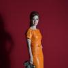 Marjorie combinou o vestido laranja à bolsa em animal print, para comparecer no lançamento da novela das seis 'Lado a Lado', em agosto de 2012