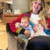 Virgínia posa usando camiseta com rosto da filha, Maria Alice, de quatro meses