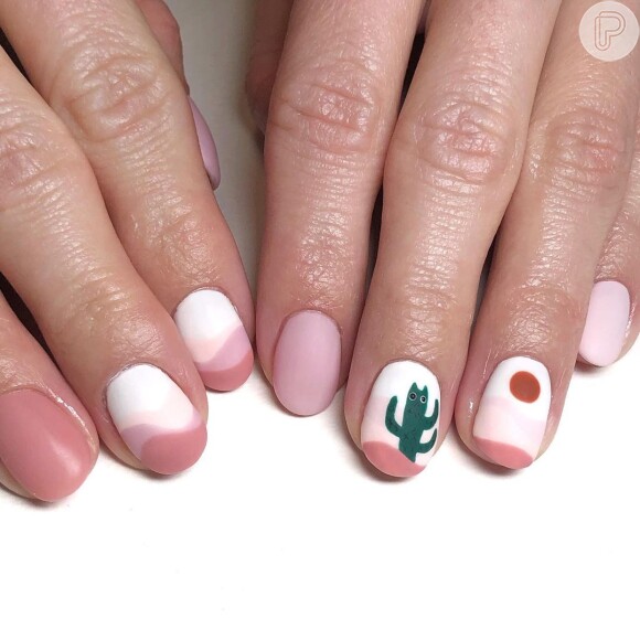 Esmalte rosa em diferentes tons foram combinados nessa nail art desertic nail