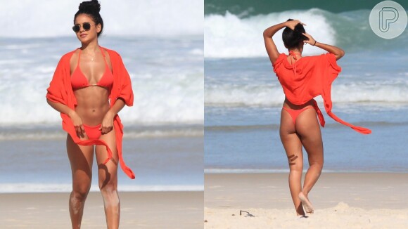 Bella Campos exibe barriga trincada e bumbum durinho na praia
 