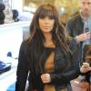 Aos cinco meses de gestação, Kim Kardashian se preocupa com ganho de peso