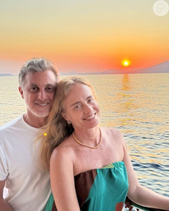 Angélica e Luciano Huck durante um pôr-do-sol europeu