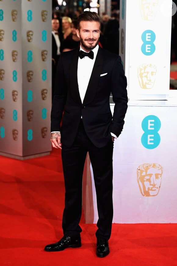 David Beckham posa no tapete vermelho do BAFTA. Ex-jogador será um dos apresentadores da premiação, que acontece nesta noite, 8 de fevereiro de 2015, em Londres