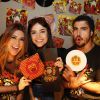 Fernanda Paes Leme, Maria Casadevall e Caio Castro posam no Lollapalooza, neste sábado, 28 de março de 2015