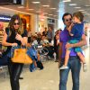 Leticia Birkheuer embarca em aeroporto do Rio na companhia do ex-marido e do filho