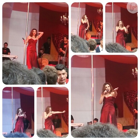 Marisa Orth usa vestido vermelho com fenda em apresentação do  Viradão Cultural de São Paulo