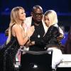 Randy Jackson tenta apaziguar as juradas Mariah Carey e Nicki Minaj, que protagonizaram inúmeras brigas no 'American Idol'