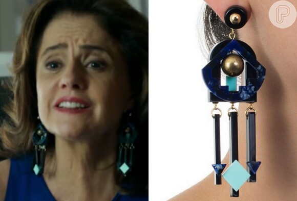 O brinco de acrílico com metais banhado a ouro velho e detalhes em azul usado por Fanny (Marieta Severo), na novela 'Verdades Secretas', é da grife Aramez. A peça está à venda no site da marca por R$ 210