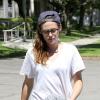 Kristen Stewart stops by a studio in North Hollywood this afternoon, looking a bit somber as she walked to and from the building with her head down. The actress wore a white T-shirt with her shirt tied at the bottom and paired it with cuffed jeans and her usual backwards hat. Kristen drove around her truck, which could use a carwash, and had 'I Love Rob' written across the hood of the car. It looks like Kristen is not over her on-and-off boyfriend, however, the actress will be keeping busy with her upcoming film, 'Camp X-Ray'. Los Angeles, CA, USA on July 8, 2013. Photo by GSI/ABACAPRESS.COM09/07/2013 - Los Angeles