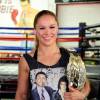 Ronda Rousey era a detentora do cinturão da categoria peso-galo do UFC
