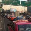 Em um dos cliques, Gianecchini mostra o tráfego intenso de Bangkok e as placas em tailandês
