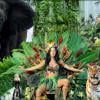 Katy Perry, a rainha, aparece com diversos animais a sua volta no clipe de 'Roar'