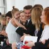 David Beckham e sua filha, Harper Seven, de 2 anos, prestigiam o desfile de Victoria Beckham no New York Fashion Week