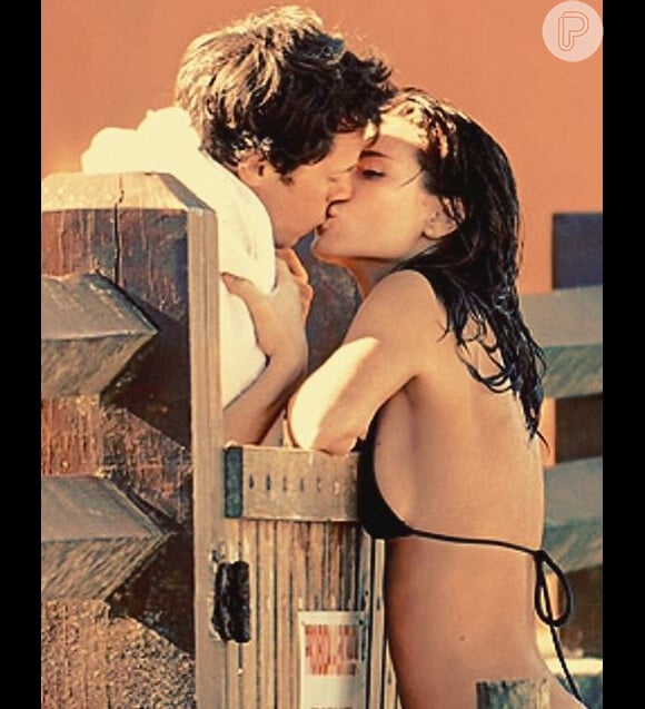 Carolina Dieckmann postou uma foto beijando o marido, Tiago Worcman