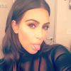 Kim Kardashian é casada com Kanye West, que estava fazendo flexão
