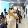 Giovanna Ewbank foi fotografada no aeroporto Santos Dumont, no Rio de Janeiro, em 15 de outubro de 2013, e se irritou com paparazzo