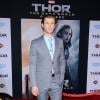 Chris Hemsworth, o intérprete do super-herói Thor, posa em première do longa