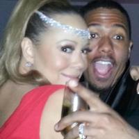 Mariah Carey posa com marido, Nick Cannon, e taça de champanhe: 'Feliz ano novo'