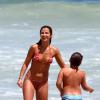 Paula Morais e Alex, filho de Ronaldo, se divertiram na praia do Leblon, Zona Sul do Rio de Janeiro, nesta segunda-feira, 9 de dezembro de 2013