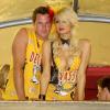 Paris Hilton esteve com o então namorado, Doug Reinhardt, no Carnaval carioca como musa de um camarote da Sapucaí em fevereiro de 2010