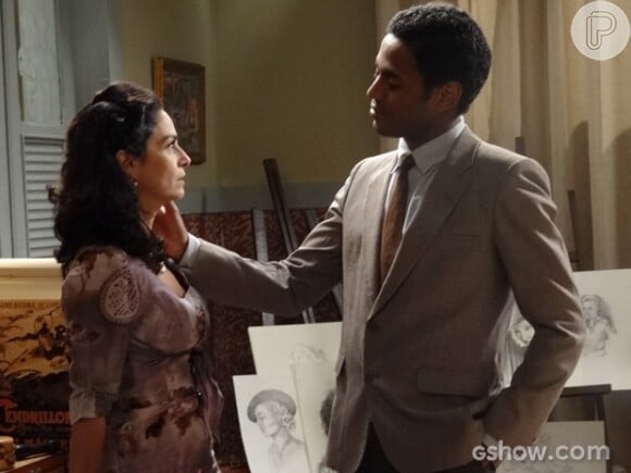 Artur (Ícaro Silva) leva Laura (Claudia Ohana) para conhecer o quarto onde ele mora, em 'Joia Rara'