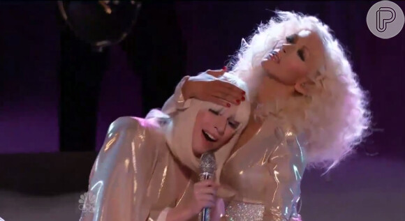 A última parceria de Gaga foi com a cantora Christina Aguilera. As duas cantaram na final da quinta temporada do 'The Voice' americano, exibido no dia 18 de dezembro de 2013. 