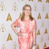 Meryl Streep posa com simpatia para os fotógrafos