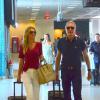 Roberto Justus e Ana Paula Siebert embarcam no aeroporto Santos Dumont, no Rio de Janeiro, em 13 de março de 2014