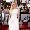 Ellie Goulding posa no tapete vermelho do MTV Movie Awards 2014