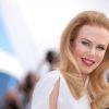 Nicole Kidman posa com simpatia para fotos durante o lançamento do filme 'Grace: A Princesa de Mônaco' no Festival de Cannes (14 de maio de 2014)