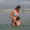 Letícia Birkheuer se divertiu com o filho, João Guilherme, no mar da praia do Pepê, na Barra da Tijuca, nesta quarta-feira, 18 de junho de 2014