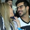 Anderson Tomazini e a namorada, Maria Fernanda Ximenes, foram fotografados torcendo pelo Botafogo